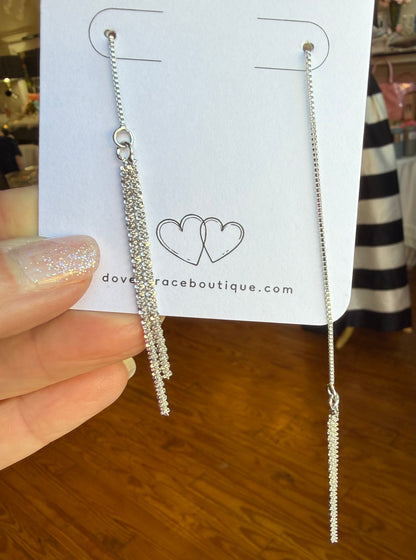 Silver chain threader earrings with a fine tassel hanging from each end.