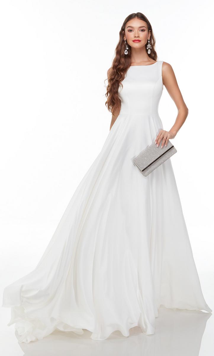 A model wearing a minimalist, sleeveless white satin A-line gown with a boat neckline and a flowing floor-length skirt
