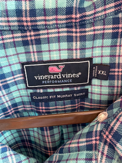 Upcycled blue plaid shirt with a ruffled collar, reworked one of a kind, at Dover Grace Boutique in Watkinsville, Georgia.