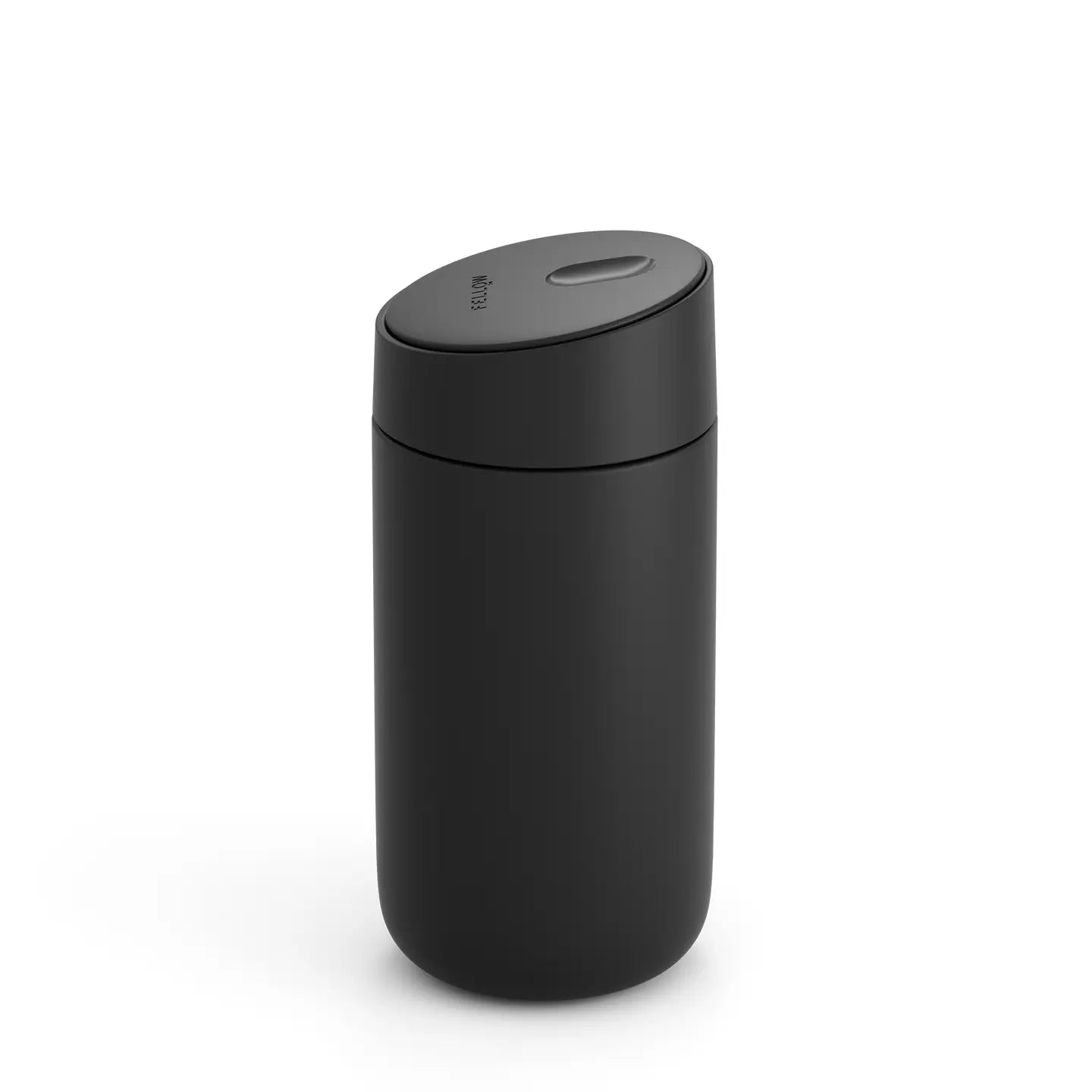A matte black, cylindrical travel mug with an angled top and a slide-open lid.