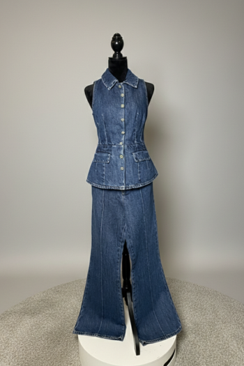 A denim two-piece set displayed on a black mannequin, featuring a sleeveless button-down peplum top with crystal-embellished buttons and matching wide-leg flared jeans with center-seam detailing.
