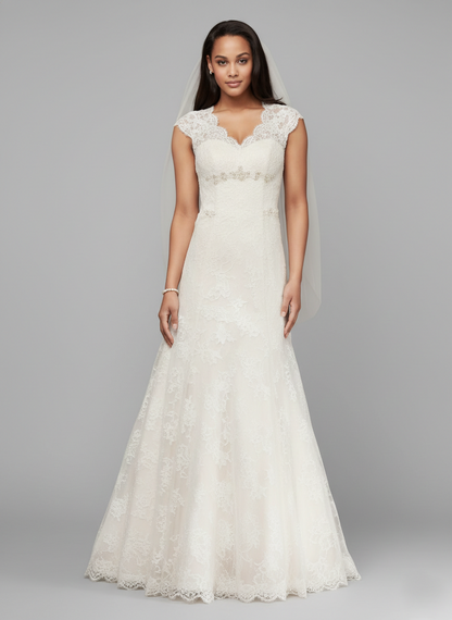 Woman wearing a white lace wedding dress on a gray background