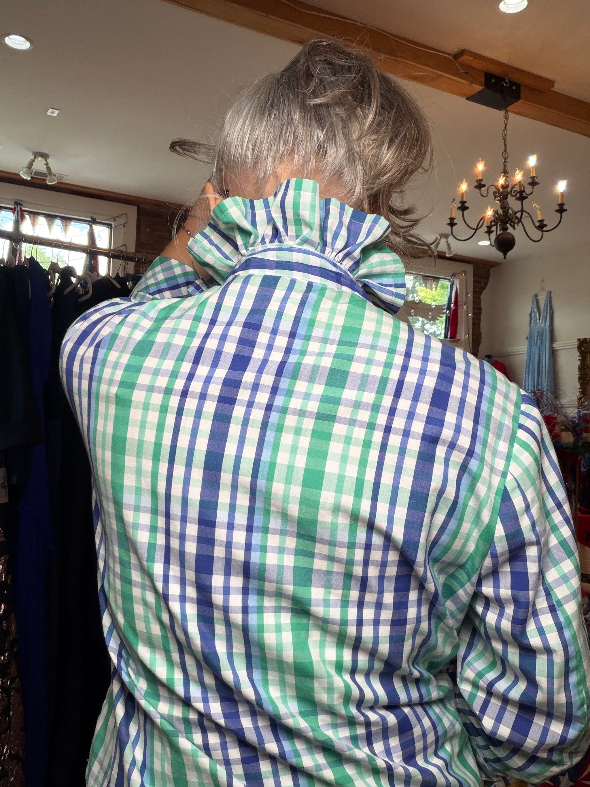 Reworked green and blue plaid shirt with a ruffled collar, a one of a kind upcycled piece from Dover Grace Boutique in Watkinsville, Georgia.