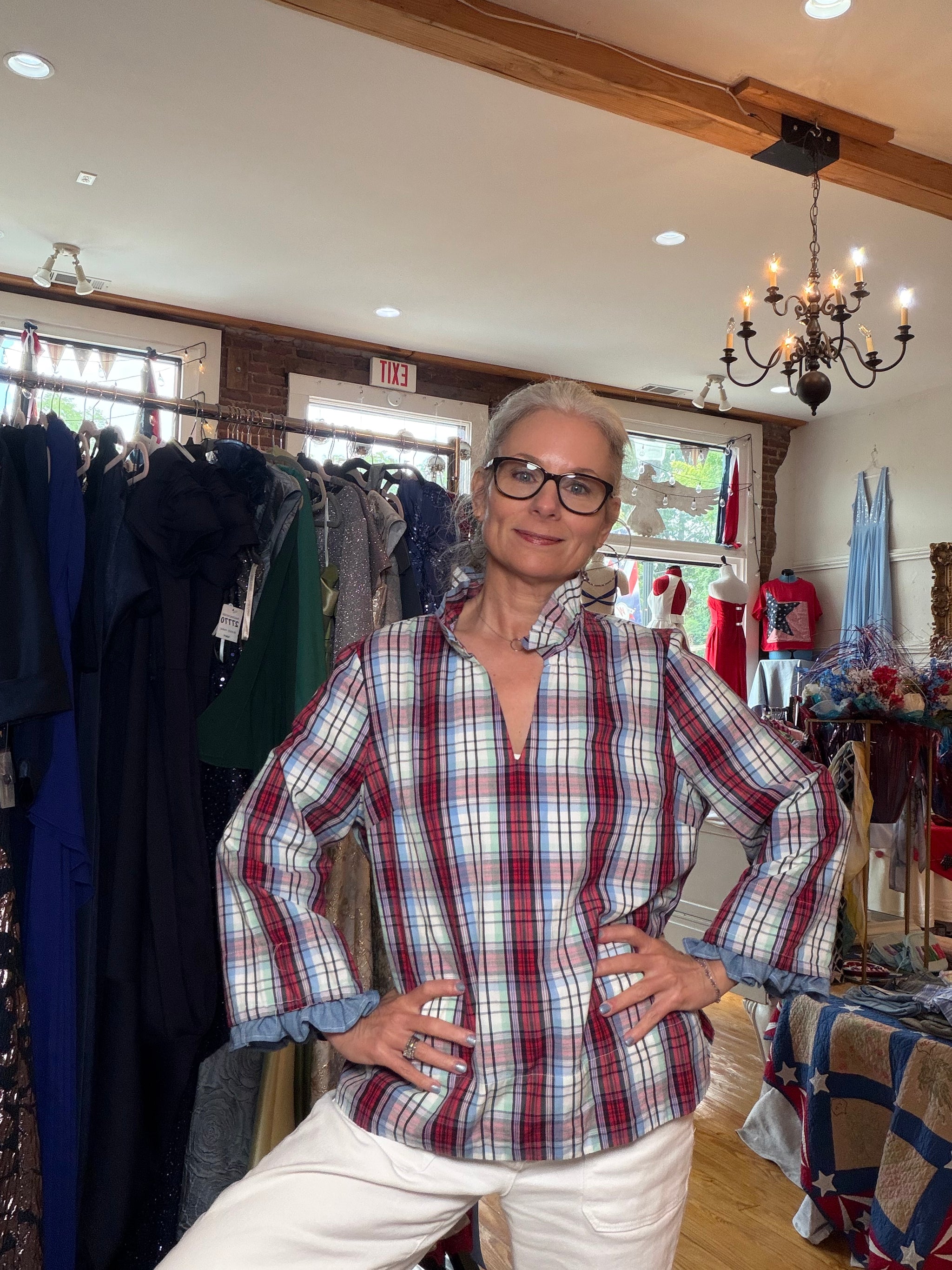 Reworked plaid button-down with dramatic ruffled sleeves, a one of a kind upcycled piece from Dover Grace Boutique in Watkinsville, Georgia.