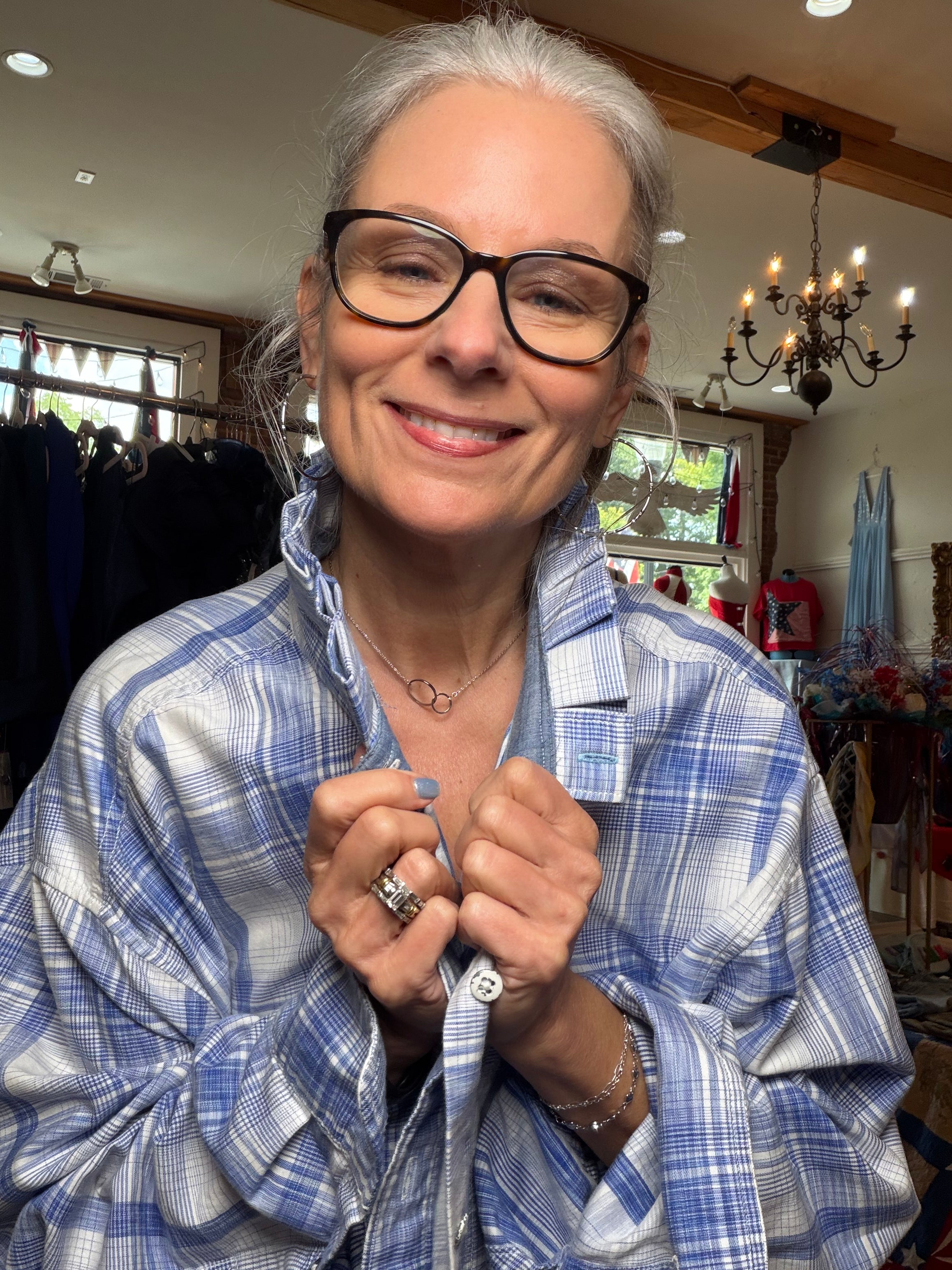 Upcycled blue and white plaid shirt with a pleated collar, reworked one of a kind, at Dover Grace Boutique in Watkinsville, Georgia.