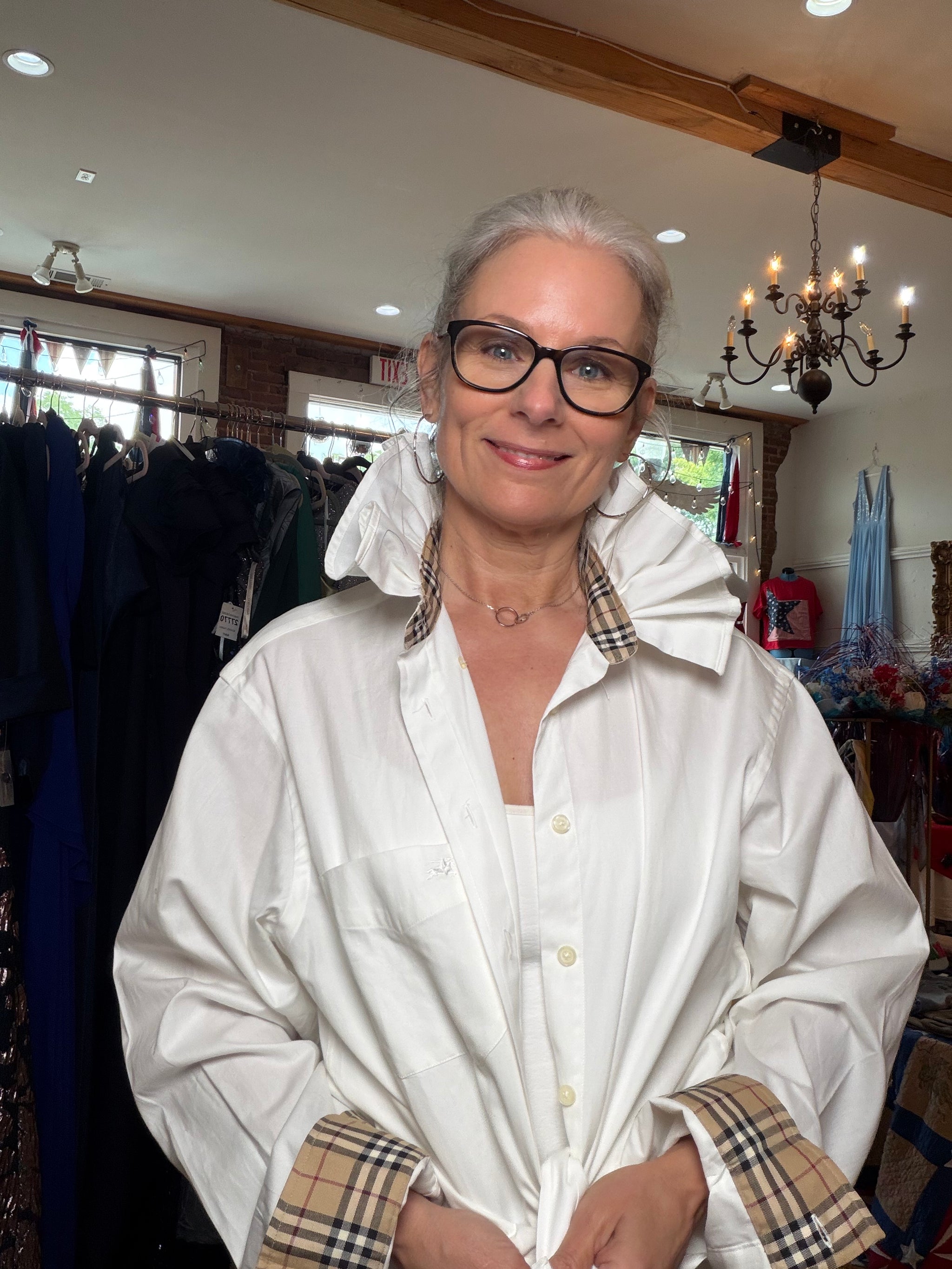 Upcycled white shirt with a tan and camel check ruffled collar and cuffs, reworked one of a kind, at Dover Grace Boutique in Watkinsville, Georgia.