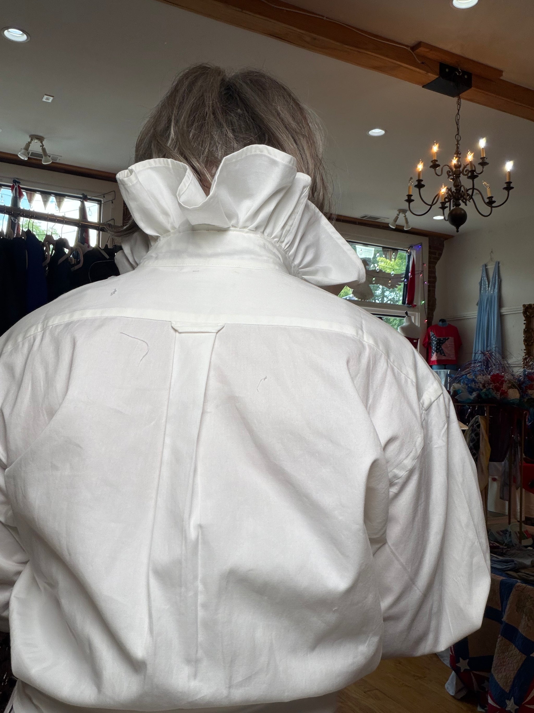Upcycled white shirt with a tan and camel check ruffled collar and cuffs, reworked one of a kind, at Dover Grace Boutique in Watkinsville, Georgia.