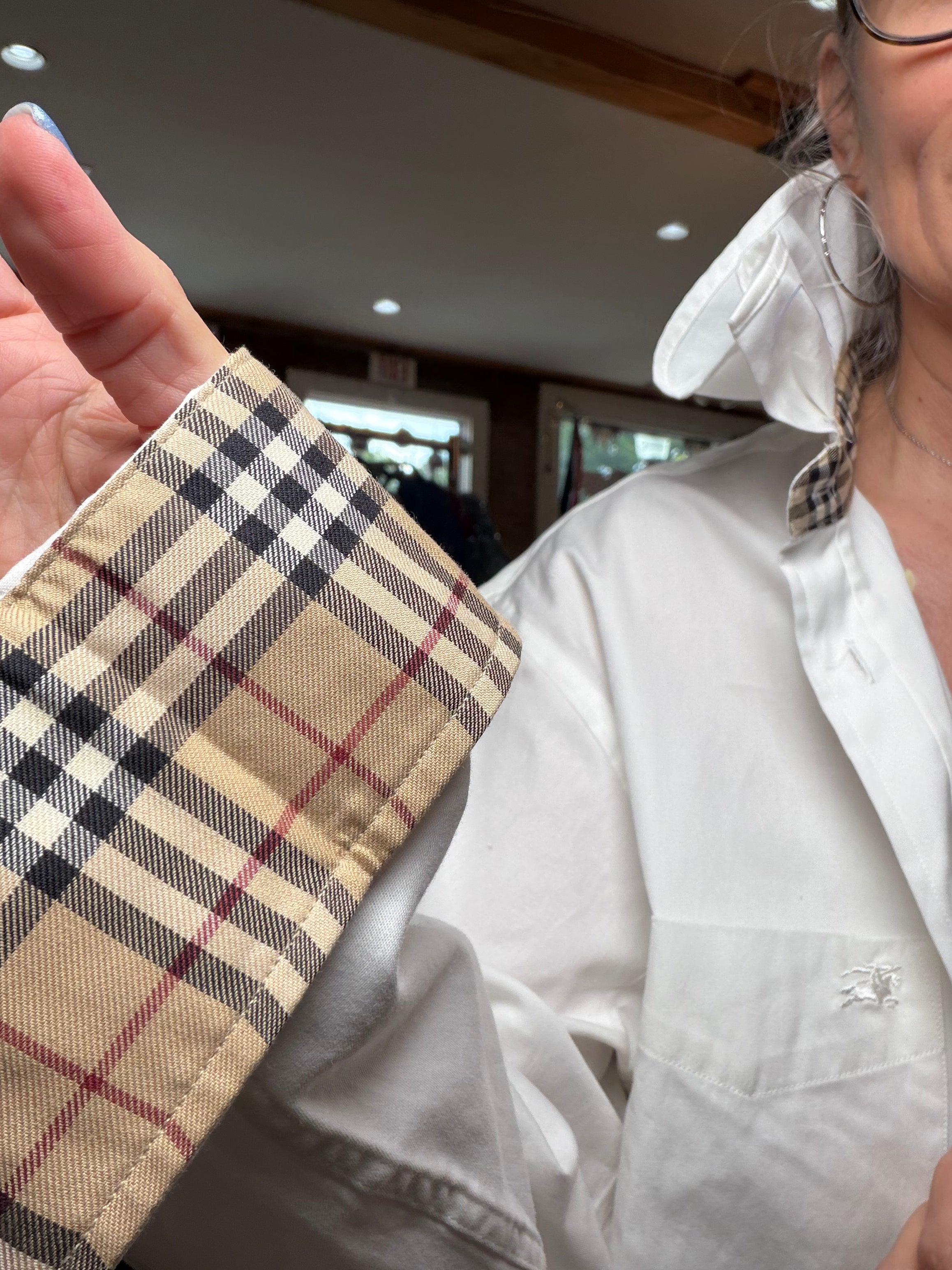 Reworked white button-down with warm camel check contrast detailing, a one of a kind upcycled piece from Dover Grace Boutique in Watkinsville, Georgia.
