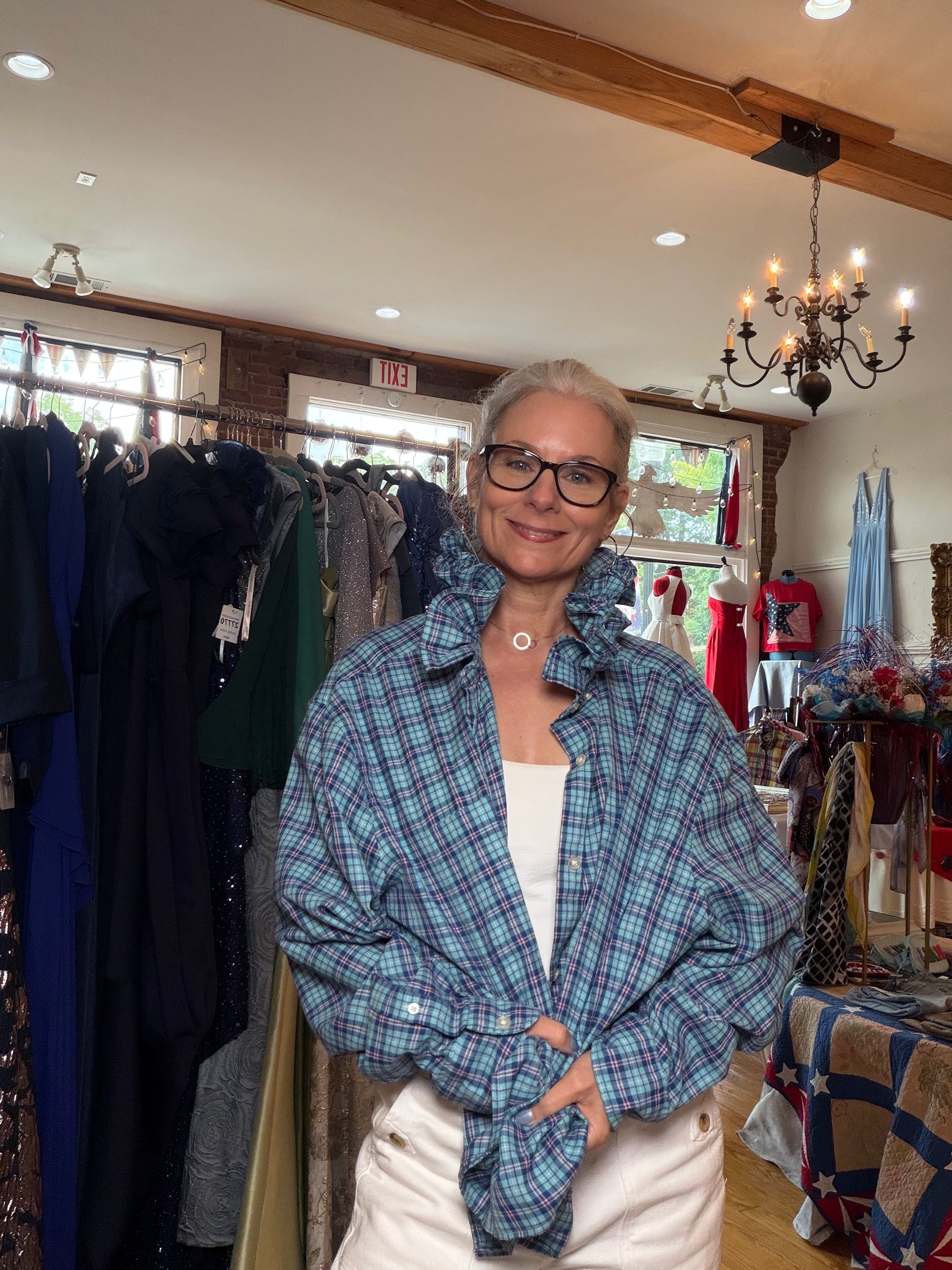 Upcycled blue plaid shirt with a ruffled collar, reworked one of a kind, at Dover Grace Boutique in Watkinsville, Georgia.