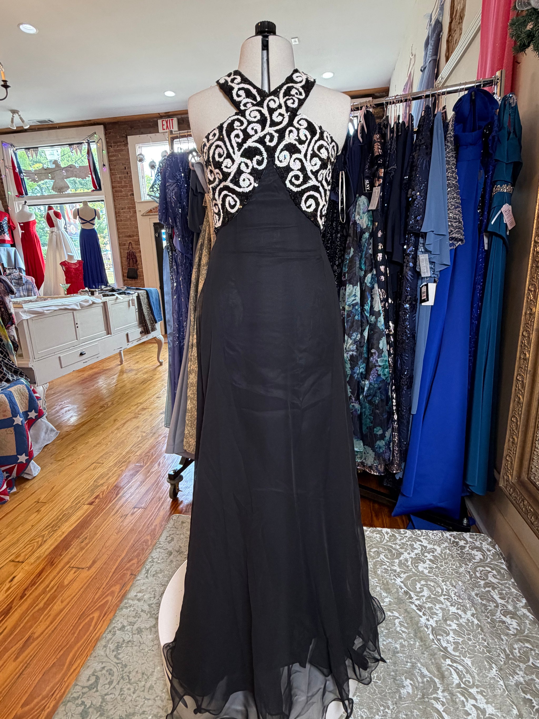 Timeless black and white vintage dress, a one of a kind curated piece from Dover Grace Boutique in Watkinsville, Georgia.