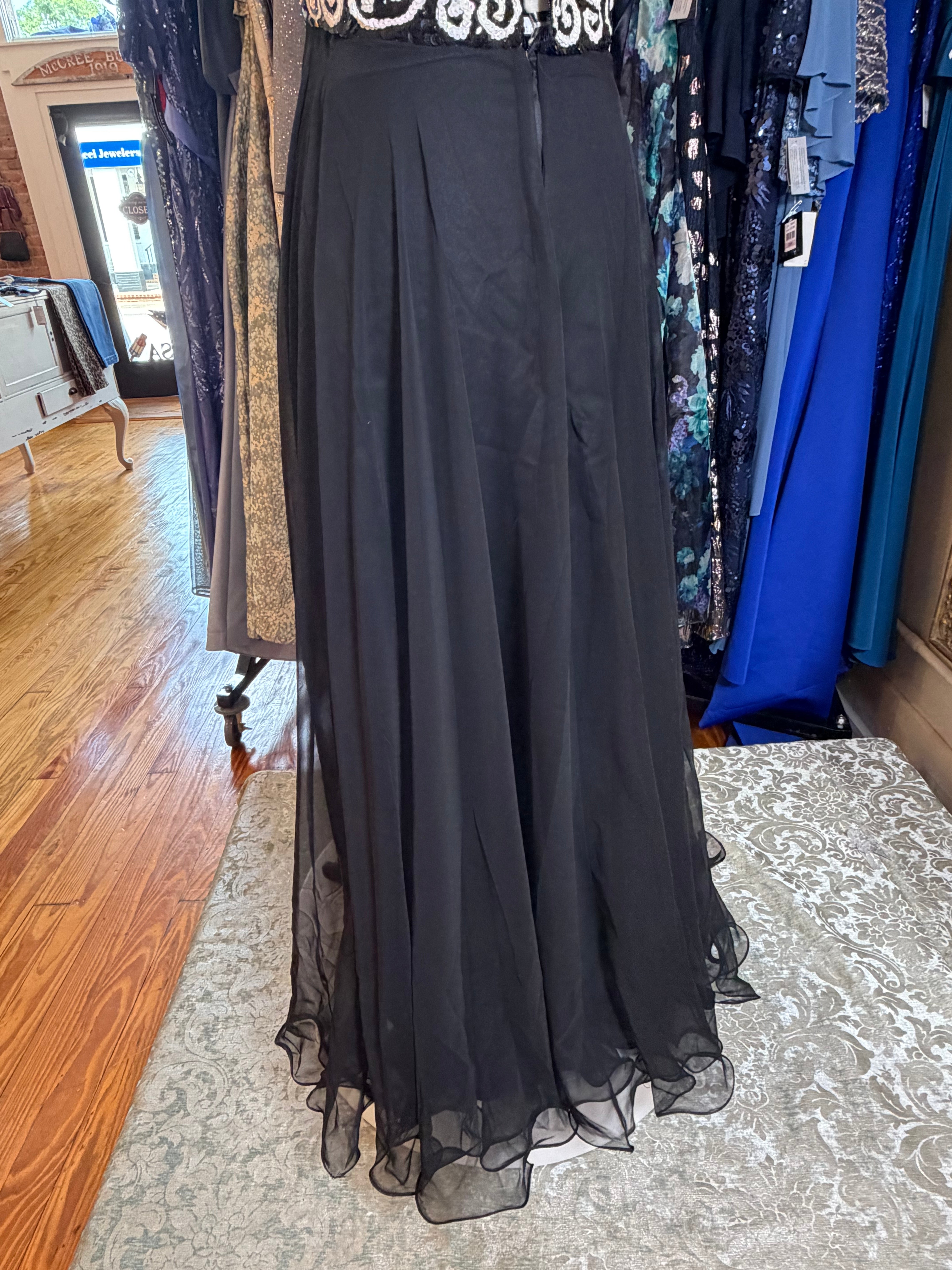 Black and white curated vintage dress at Dover Grace Boutique in Watkinsville, Georgia.