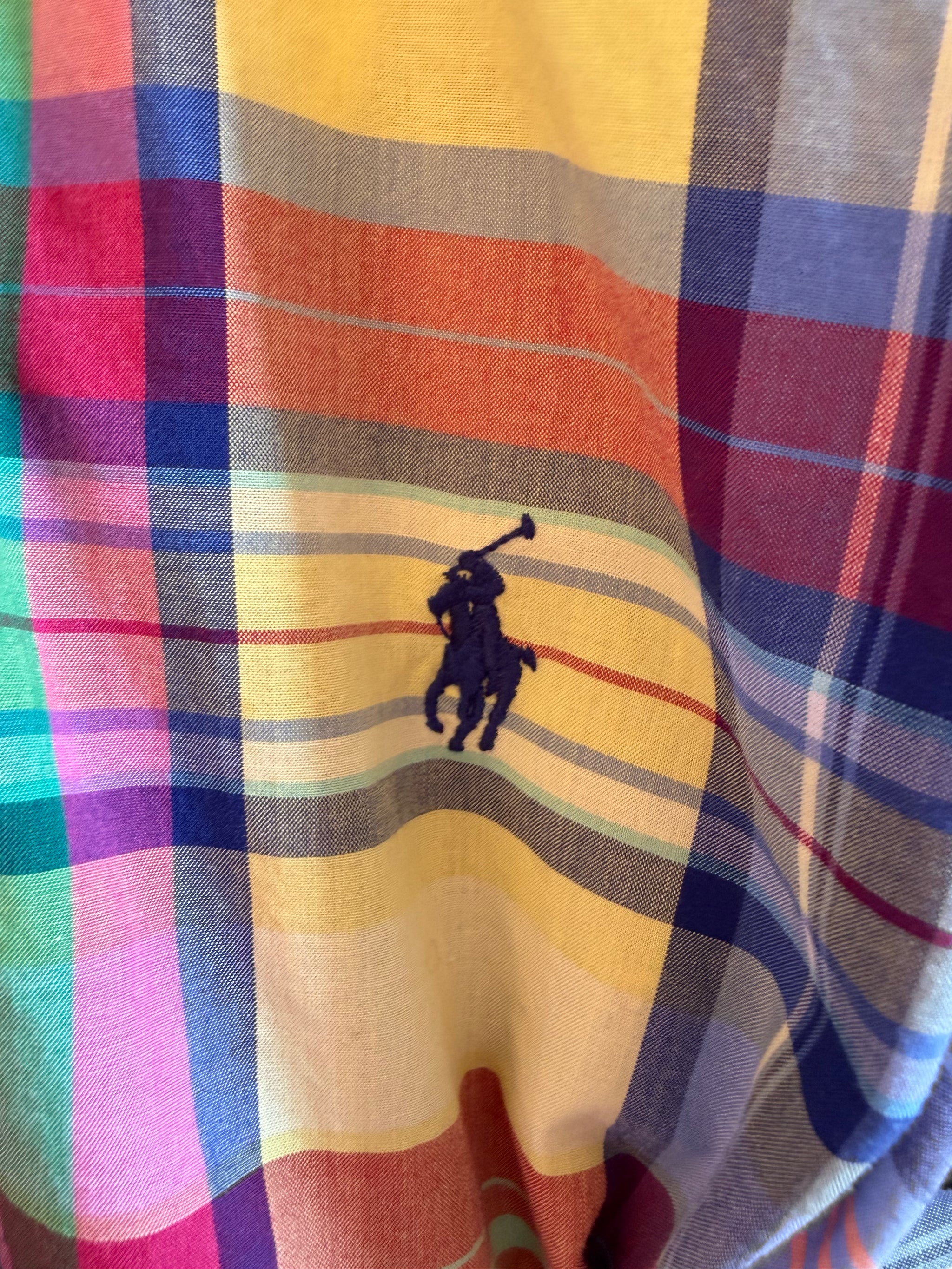 Upcycled bright primary color plaid shirt, reworked one of a kind, at Dover Grace Boutique in Watkinsville, Georgia.