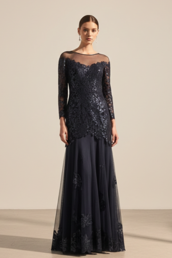 Woman wearing a black lace dress against a neutral background