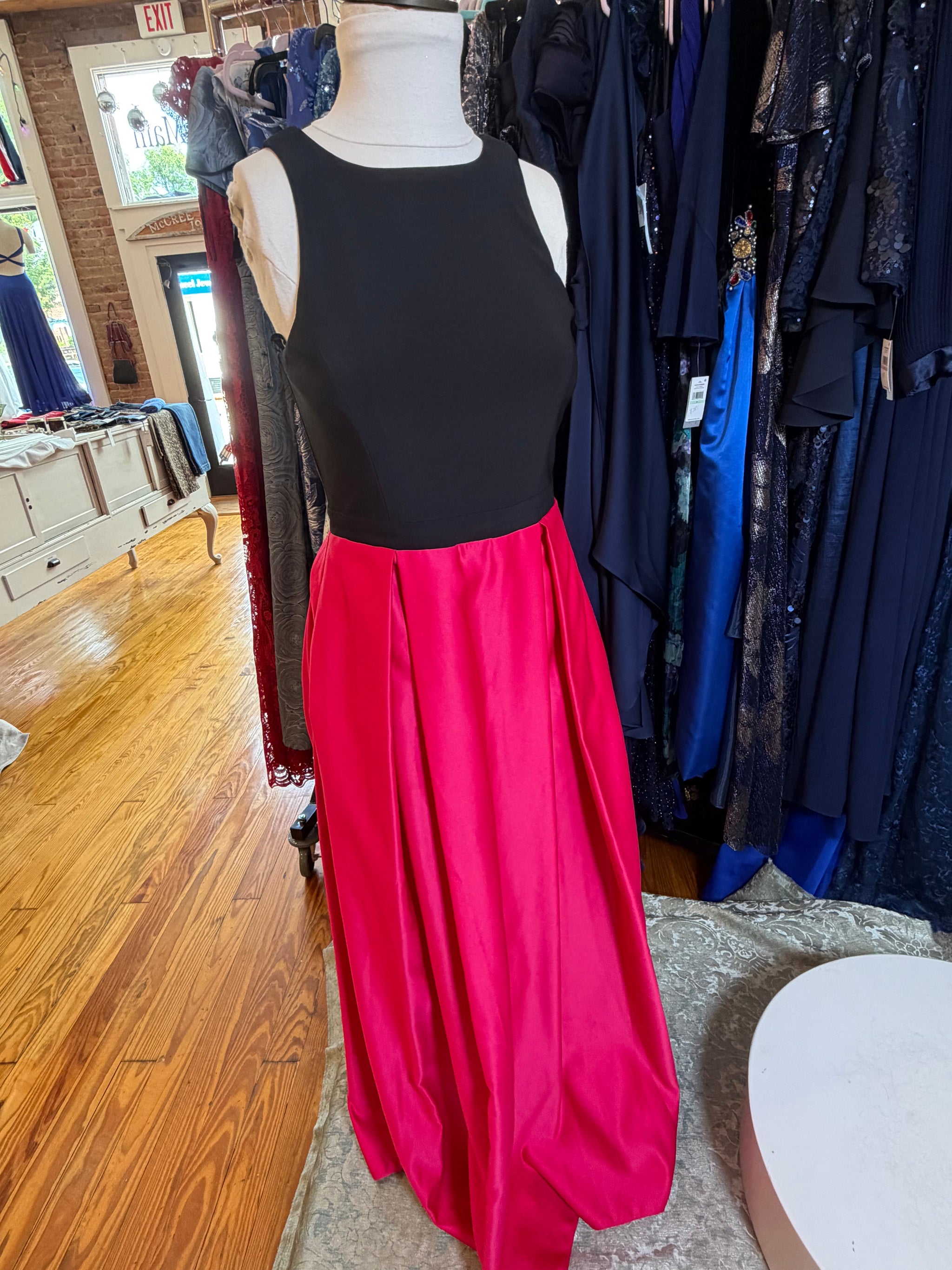 Betsy & Adam black and pink pleated skirt gown, front full-length view