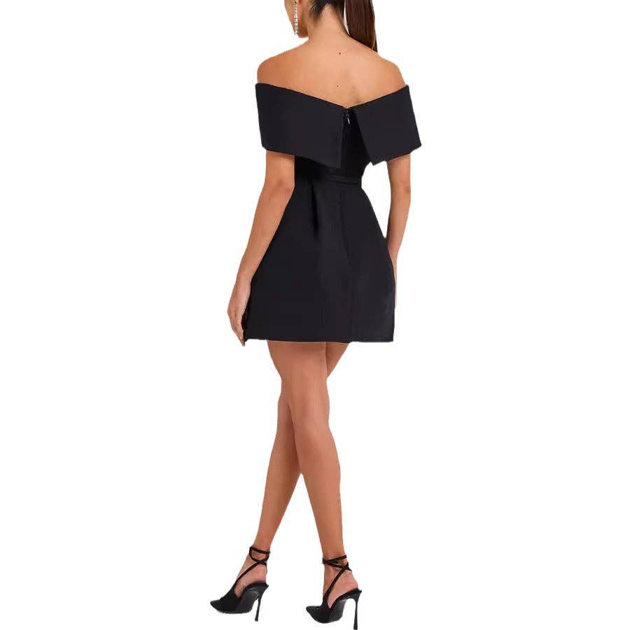 Back view of black off-shoulder belted dress at Dover Grace Boutique in Watkinsville, Georgia.
