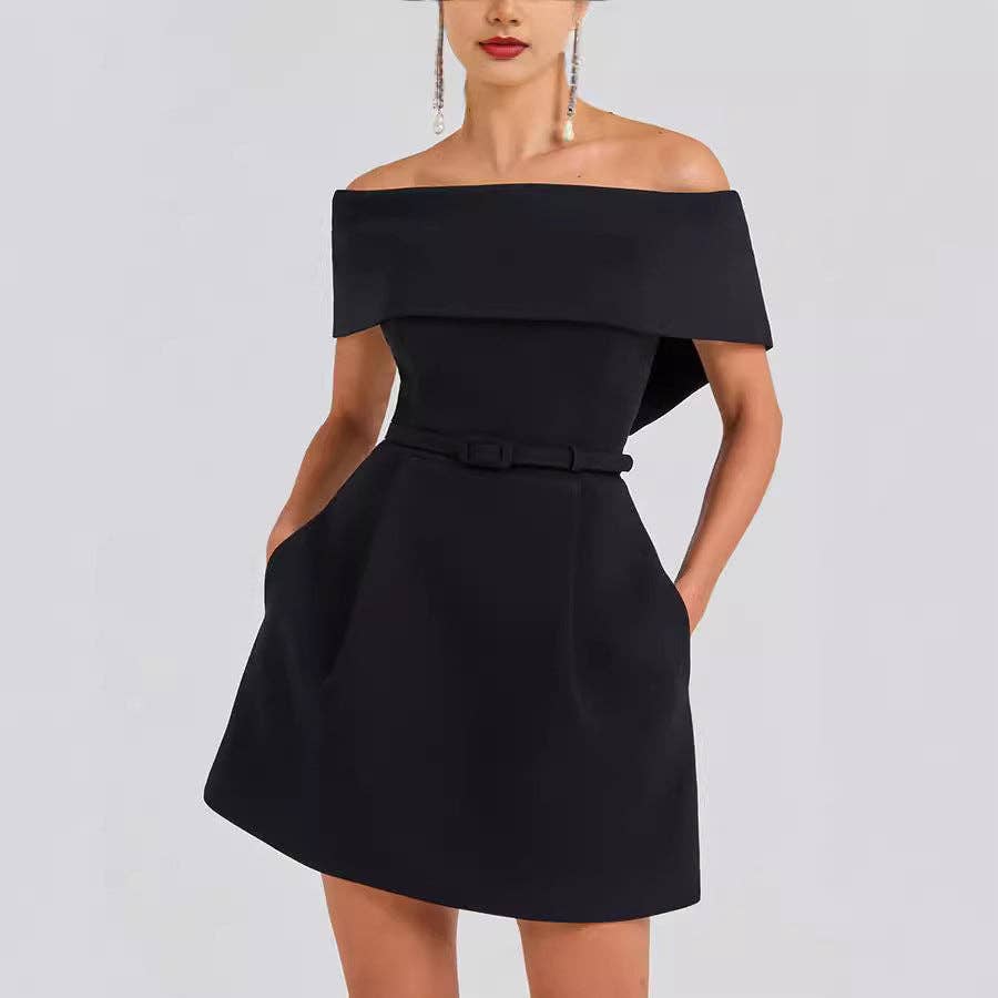 Model in black off-shoulder belted mini dress at Dover Grace Boutique in Watkinsville, Georgia.