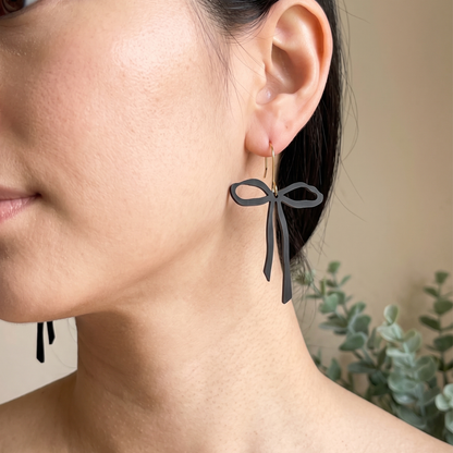 Black Bow Dangle Earrings: Marble Acrylic, Gold Findings