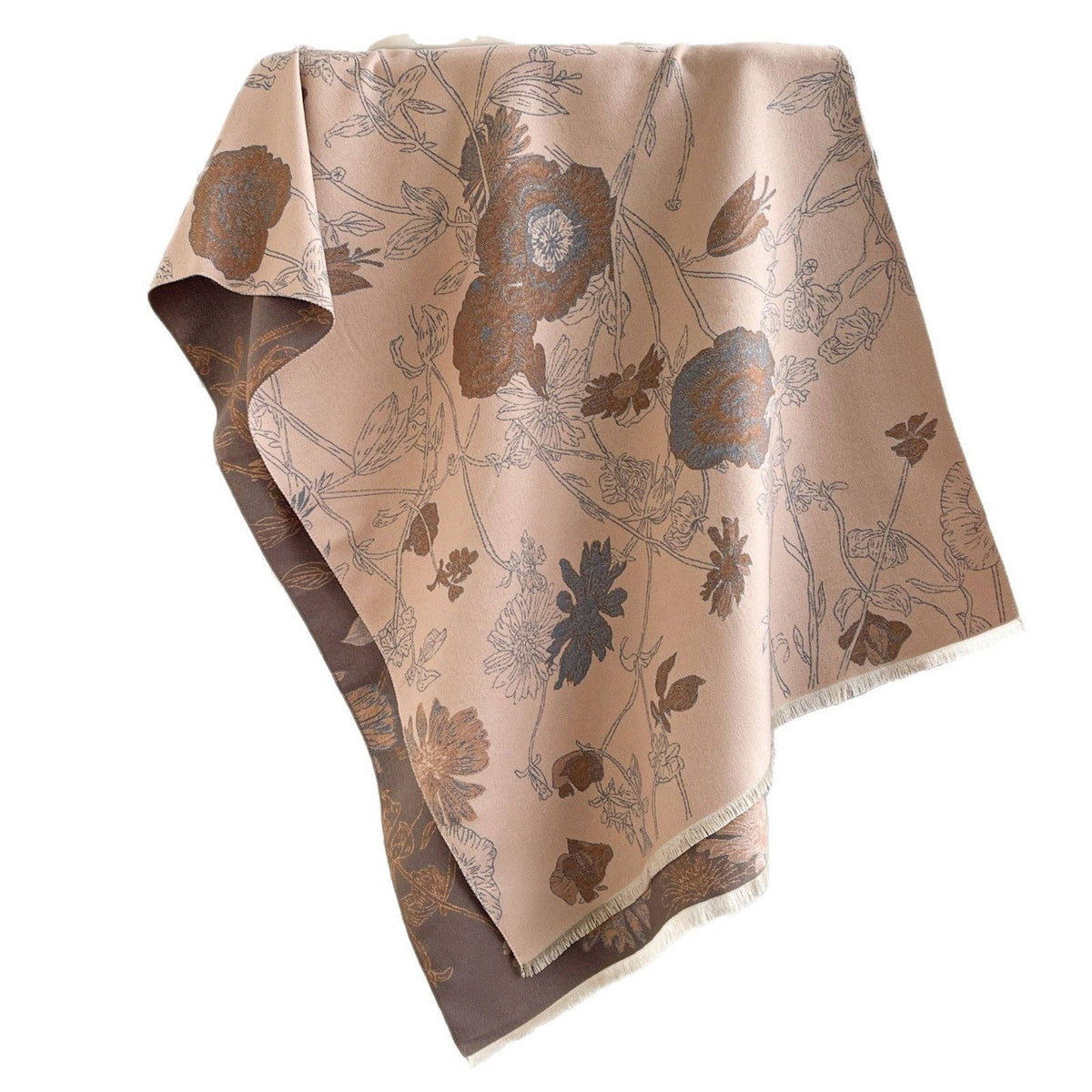 Folded blush printed scarf on white backdrop at Dover Grace Boutique in Watkinsville, Georgia.
