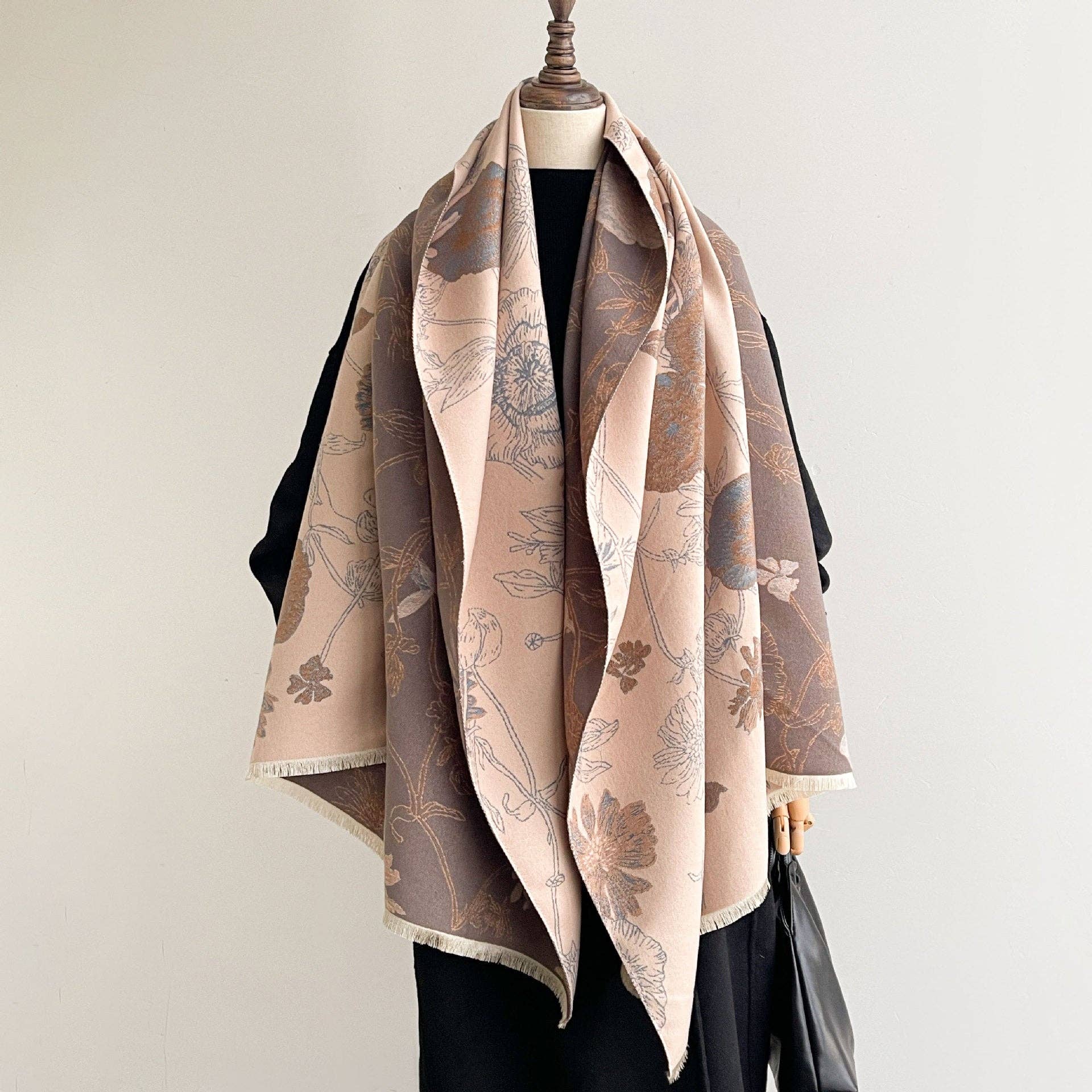 Blush printed scarf wrap on mannequin at Dover Grace Boutique in Watkinsville, Georgia.