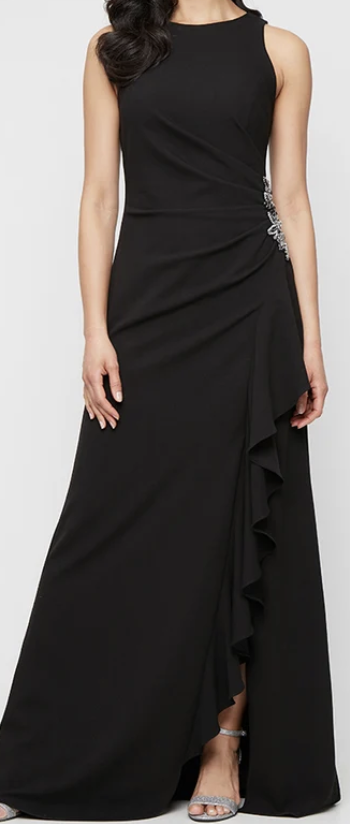 Black sleeveless stretch crepe gown with beaded hip and ruffle skirt at Dover Grace Boutique in Watkinsville, Georgia.