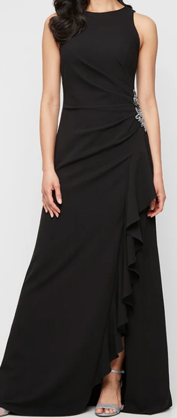 Black sleeveless stretch crepe gown with beaded hip and ruffle skirt at Dover Grace Boutique in Watkinsville, Georgia.