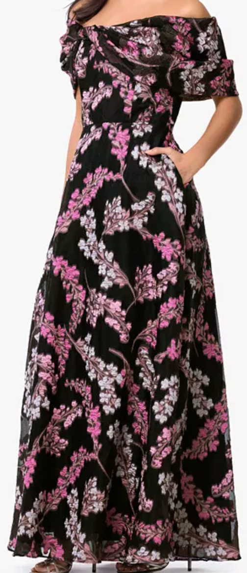 Floral organza brocade off-shoulder gown with pockets at Dover Grace Boutique in Watkinsville, Georgia.