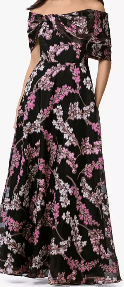 Floral organza brocade off-shoulder gown with pockets at Dover Grace Boutique in Watkinsville, Georgia.