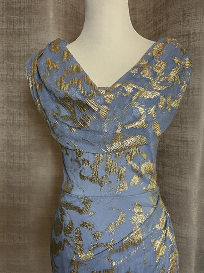 Light blue and gold metallic draped evening gown at Dover Grace Boutique in Watkinsville, Georgia.