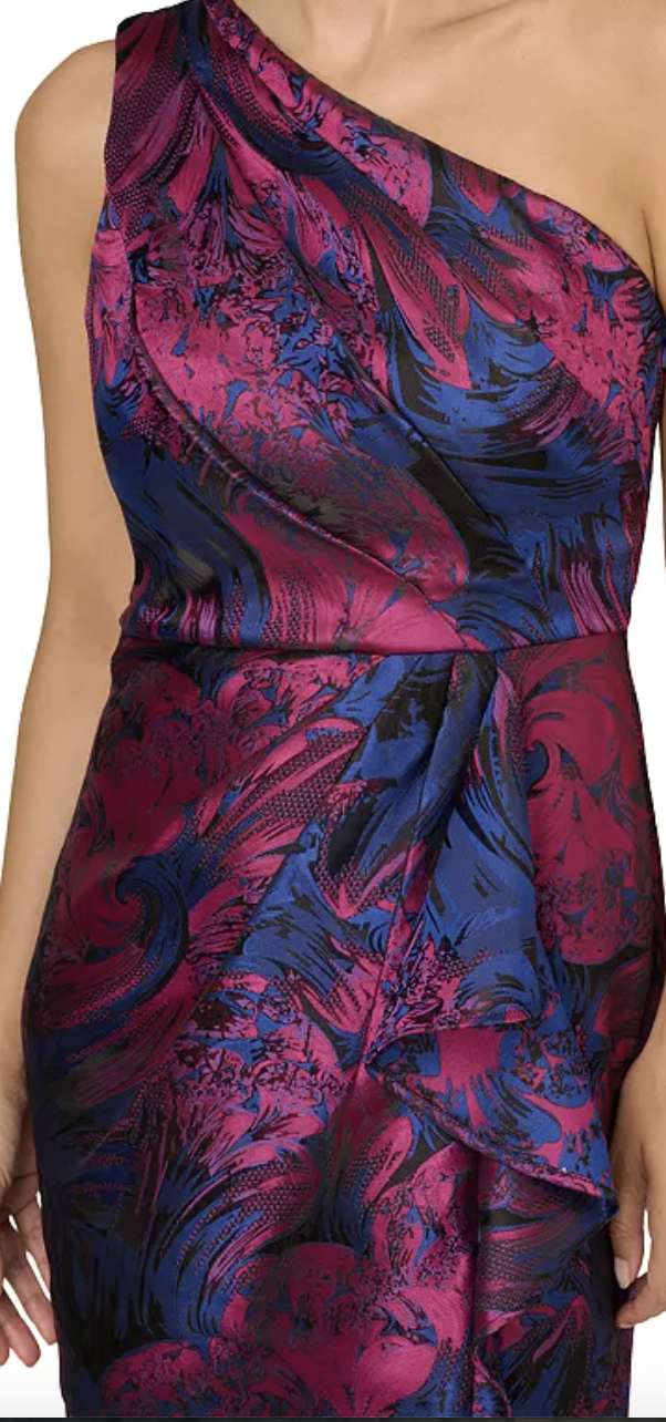 Navy and orchid metallic jacquard one-shoulder mermaid gown at Dover Grace Boutique in Watkinsville, Georgia.