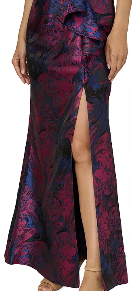 Navy and orchid metallic jacquard one-shoulder mermaid gown at Dover Grace Boutique in Watkinsville, Georgia.