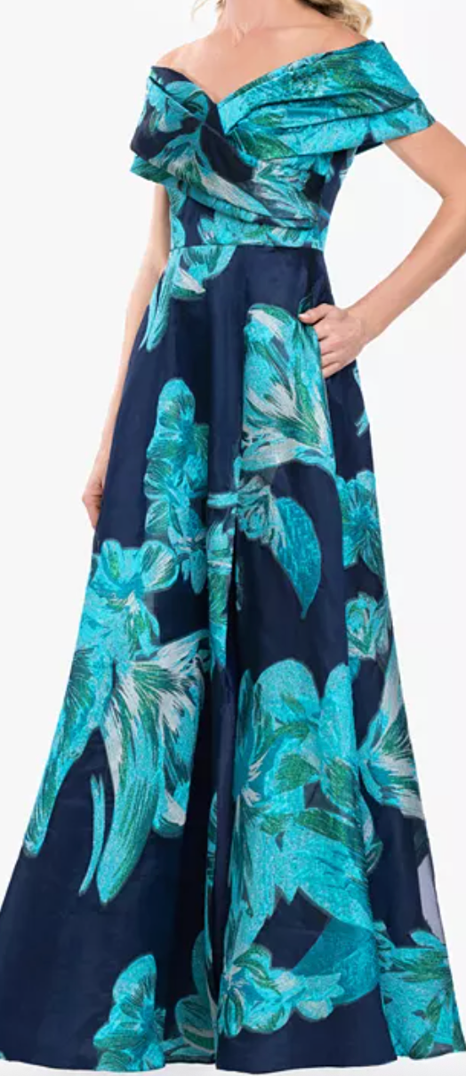 Navy and teal floral jacquard off-shoulder evening gown at Dover Grace Boutique in Watkinsville, Georgia.