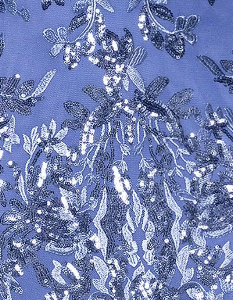 Periwinkle sequin leaf print mesh evening gown with flutter sleeves at Dover Grace Boutique in Watkinsville, Georgia.
