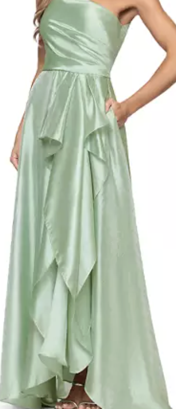 Sage green one-shoulder organza A-line evening gown at Dover Grace Boutique in Watkinsville, Georgia.