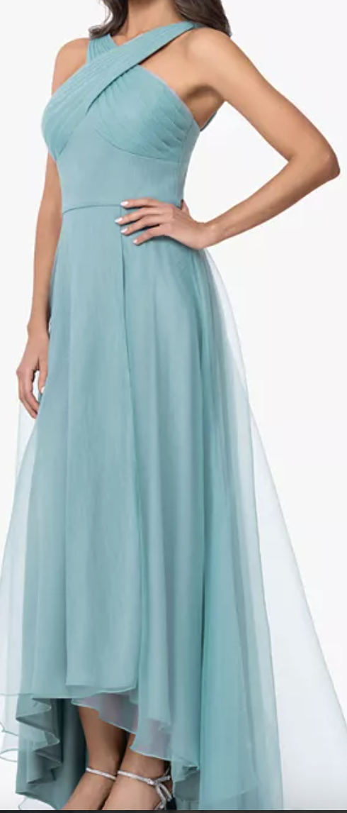 Seafoam tulle high-low gown with crisscross neckline at Dover Grace Boutique in Watkinsville, Georgia.