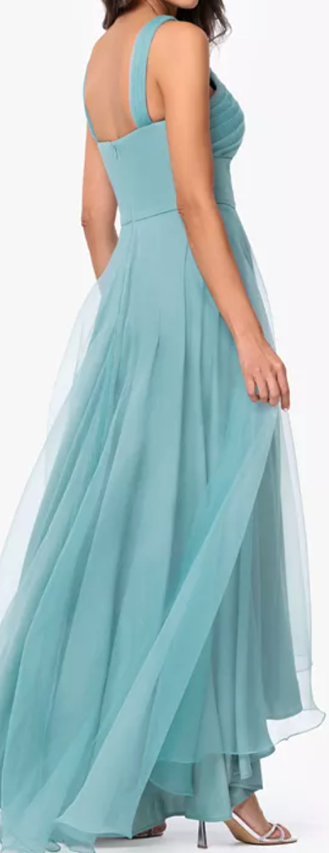 Seafoam tulle high-low gown with crisscross neckline at Dover Grace Boutique in Watkinsville, Georgia.