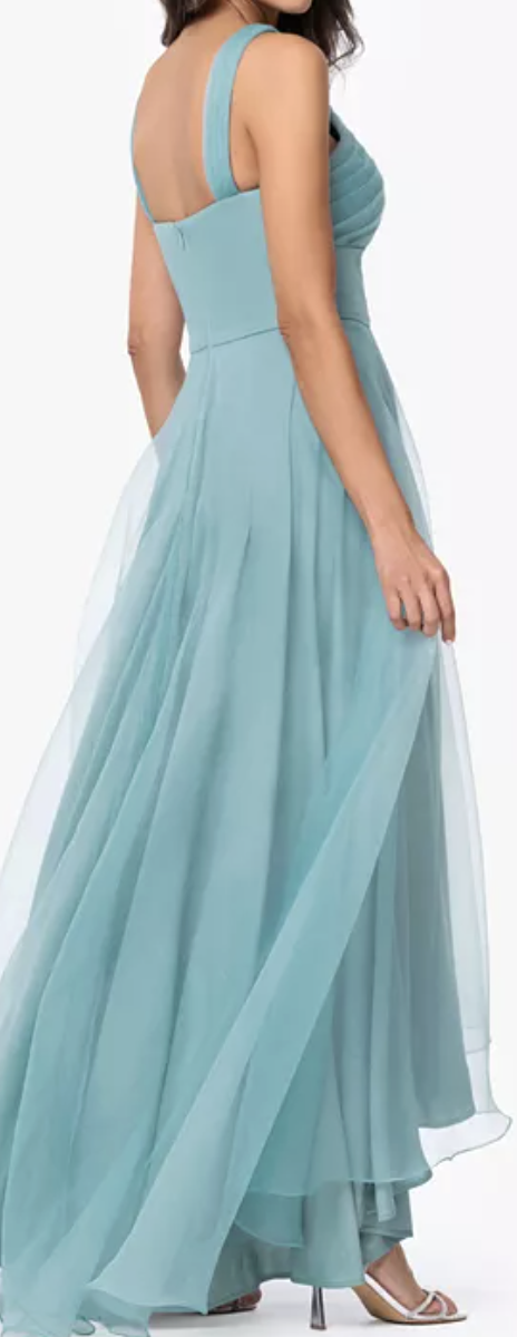 Seafoam tulle high-low gown with crisscross neckline at Dover Grace Boutique in Watkinsville, Georgia.