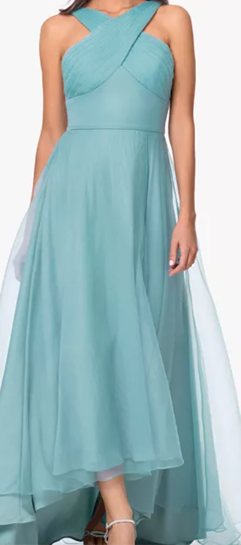 Seafoam tulle high-low gown with crisscross neckline at Dover Grace Boutique in Watkinsville, Georgia.