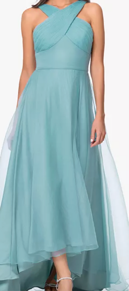 Seafoam tulle high-low gown with crisscross neckline at Dover Grace Boutique in Watkinsville, Georgia.