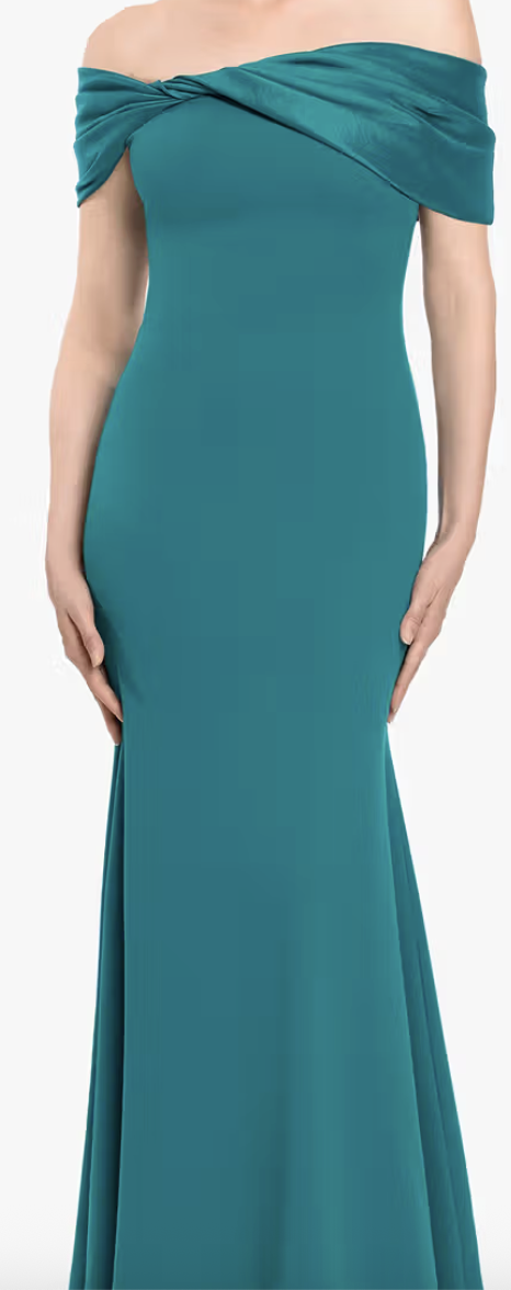 Teal off-shoulder twist sheath evening gown at Dover Grace Boutique in Watkinsville, Georgia.