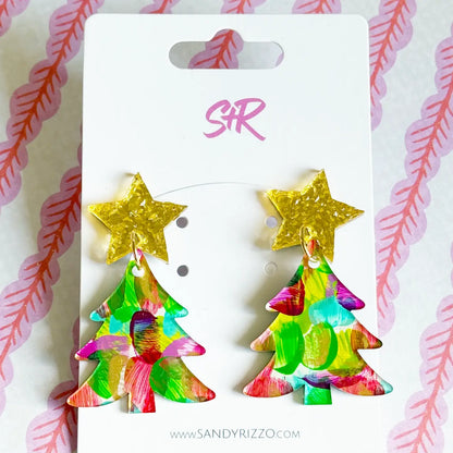 A pair of holiday-themed drop earrings featuring textured gold bow posts and colorful, hand-painted bulb-shaped dangles with vibrant green, red, and pink brushstrokes.