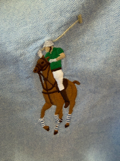 Embroidered polo player in green and white on a light blue Ralph Lauren oxford shirt