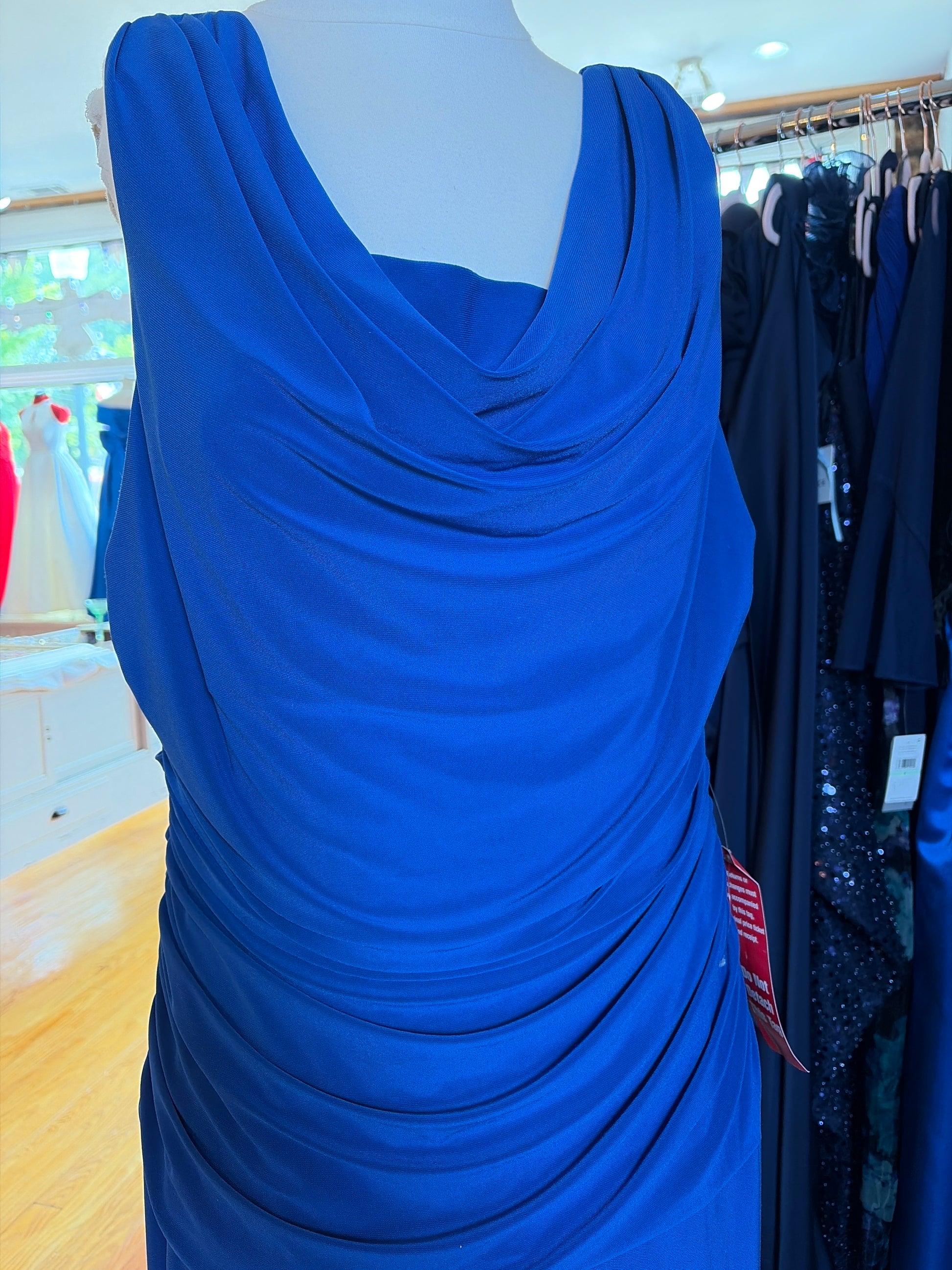 Close-up of cowl neckline and ruched bodice on R&M Richards royal blue gown