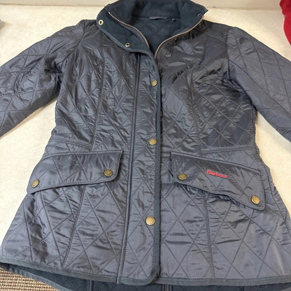 Gray quilted jacket with brand logo on a light background
