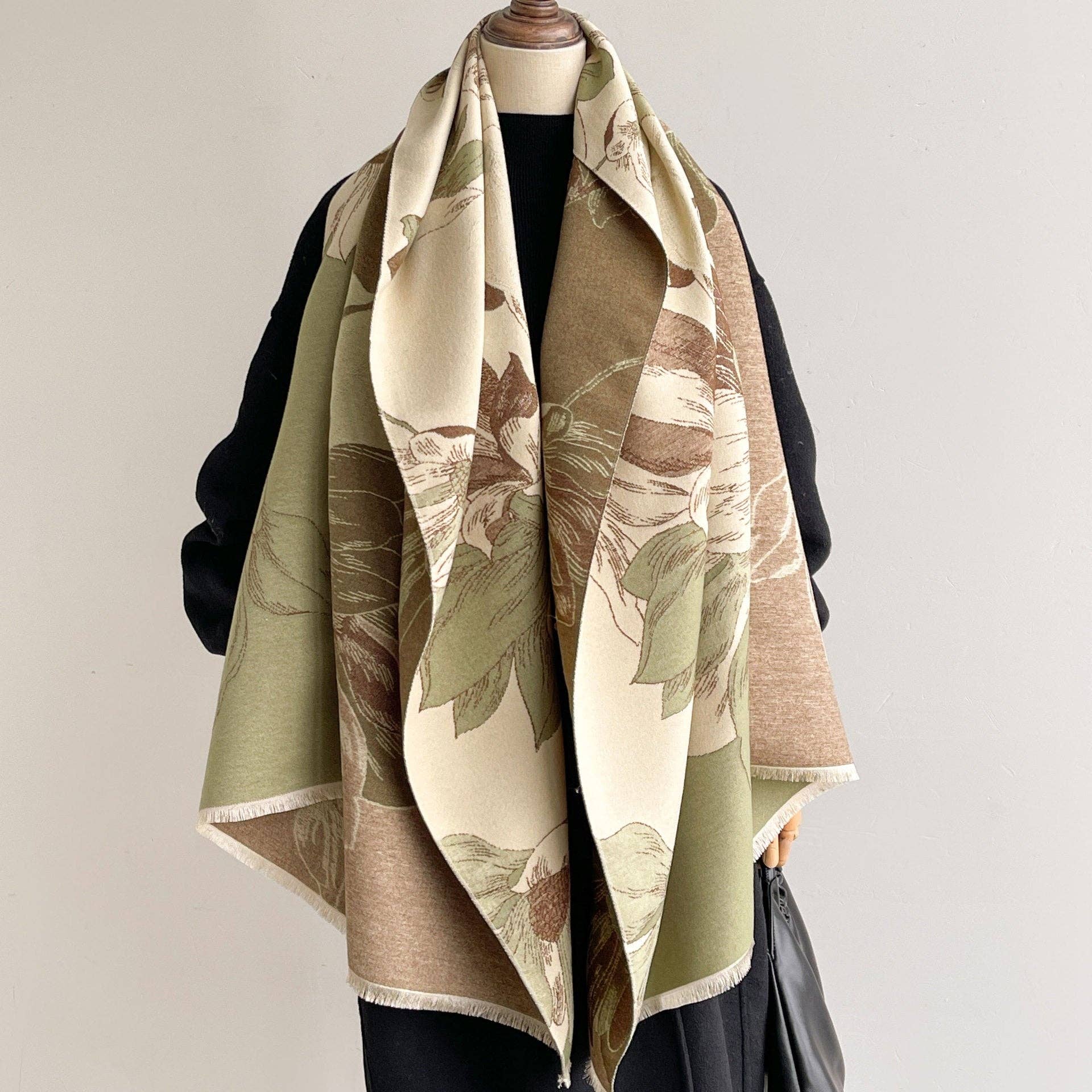 Sage and cream floral scarf on mannequin at Dover Grace Boutique in Watkinsville, Georgia.