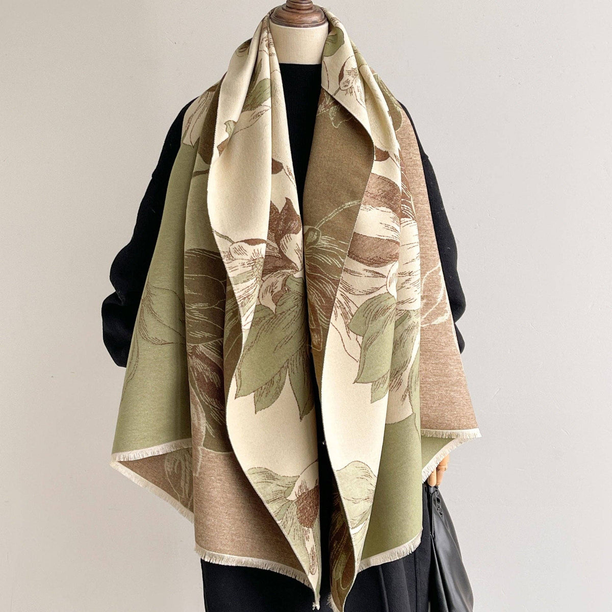 Sage and cream floral scarf on mannequin at Dover Grace Boutique in Watkinsville, Georgia.
