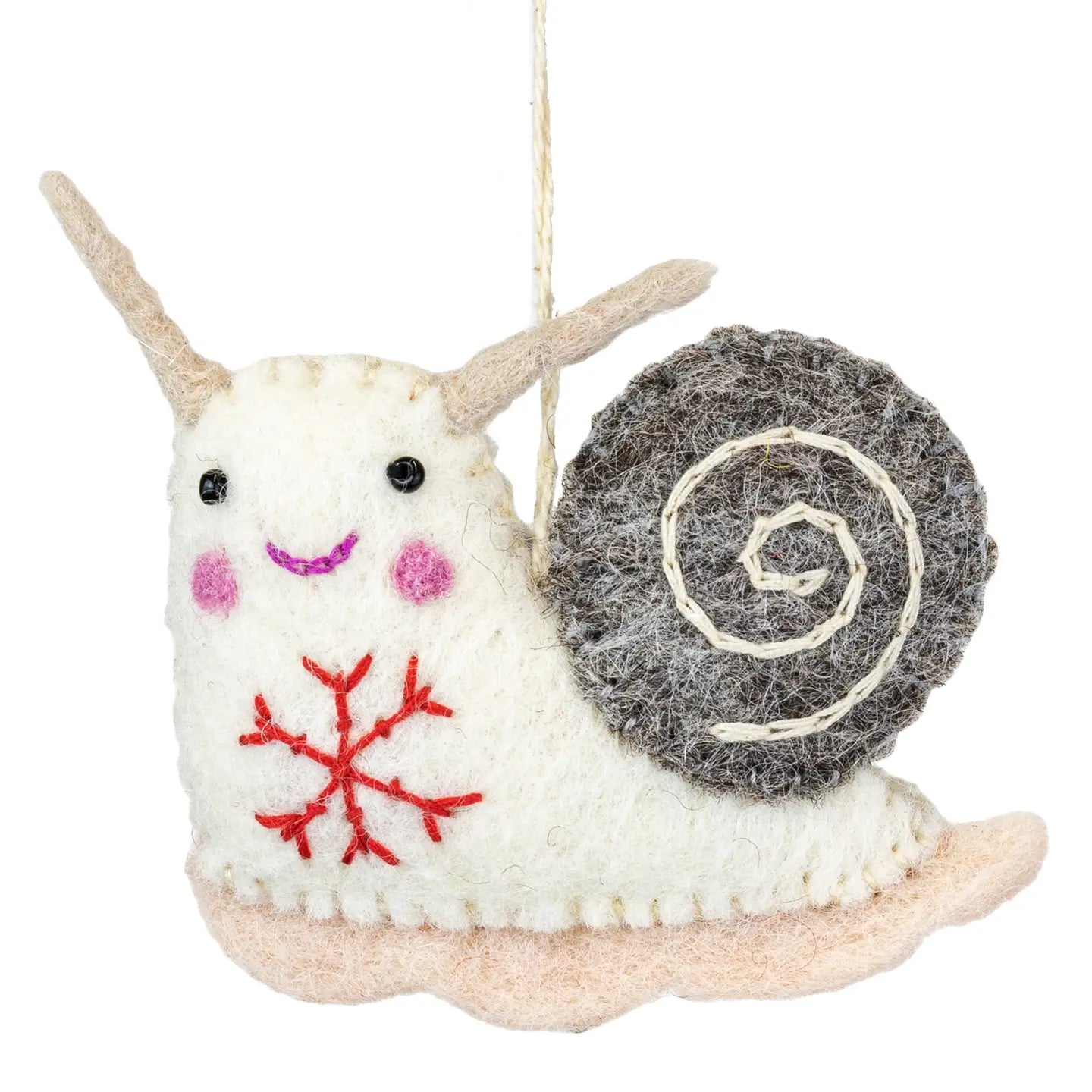 A white felt snail ornament with a grey shell and red snowflake embroidery.