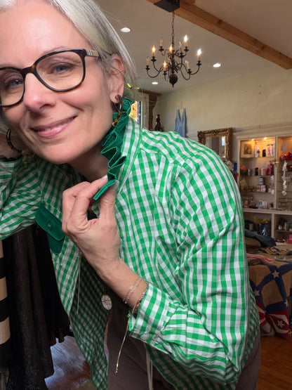 Close-up of the green ruffle collar on an upcycled green and white gingham shirt.