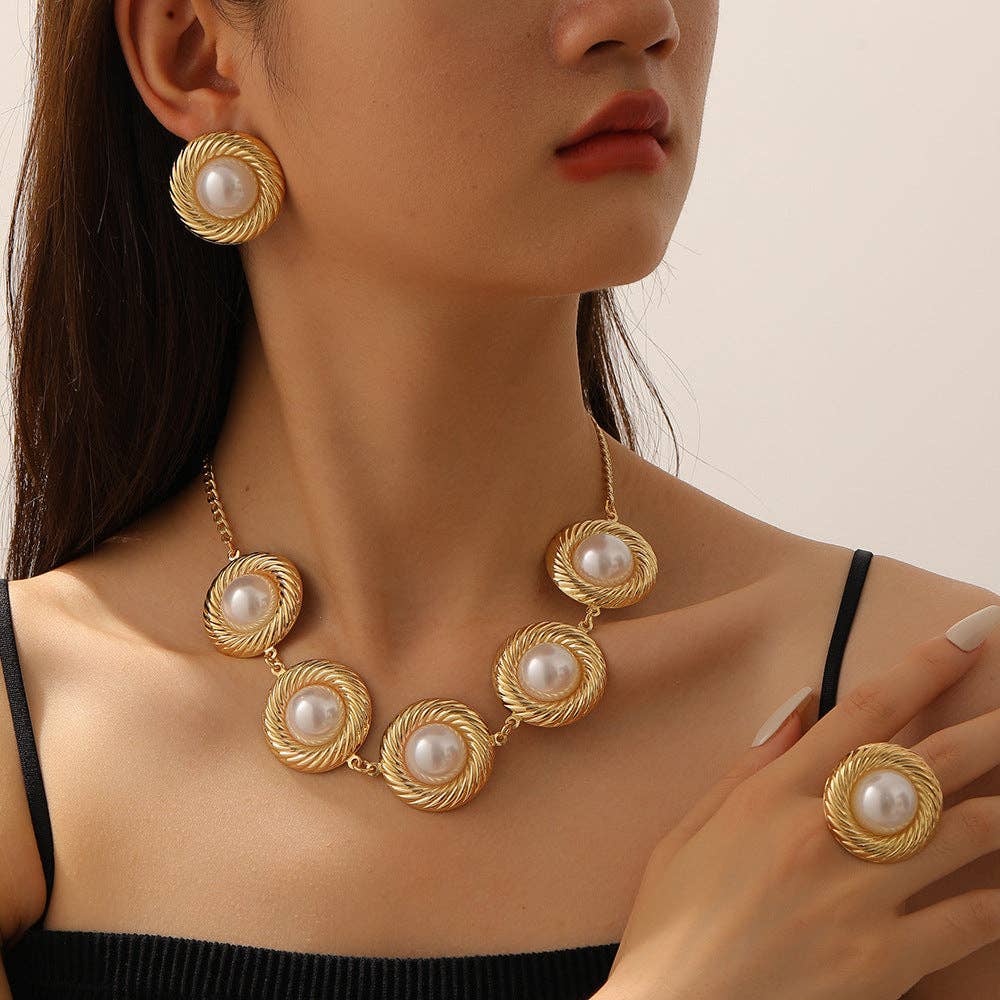 White pearl necklace, earring and ring on model at Dover Grace Boutique in Watkinsville, Georgia.